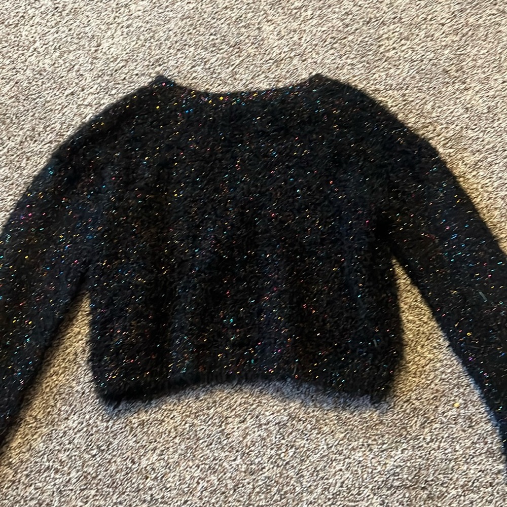 Black fluffy sweater with multicolor sparkles